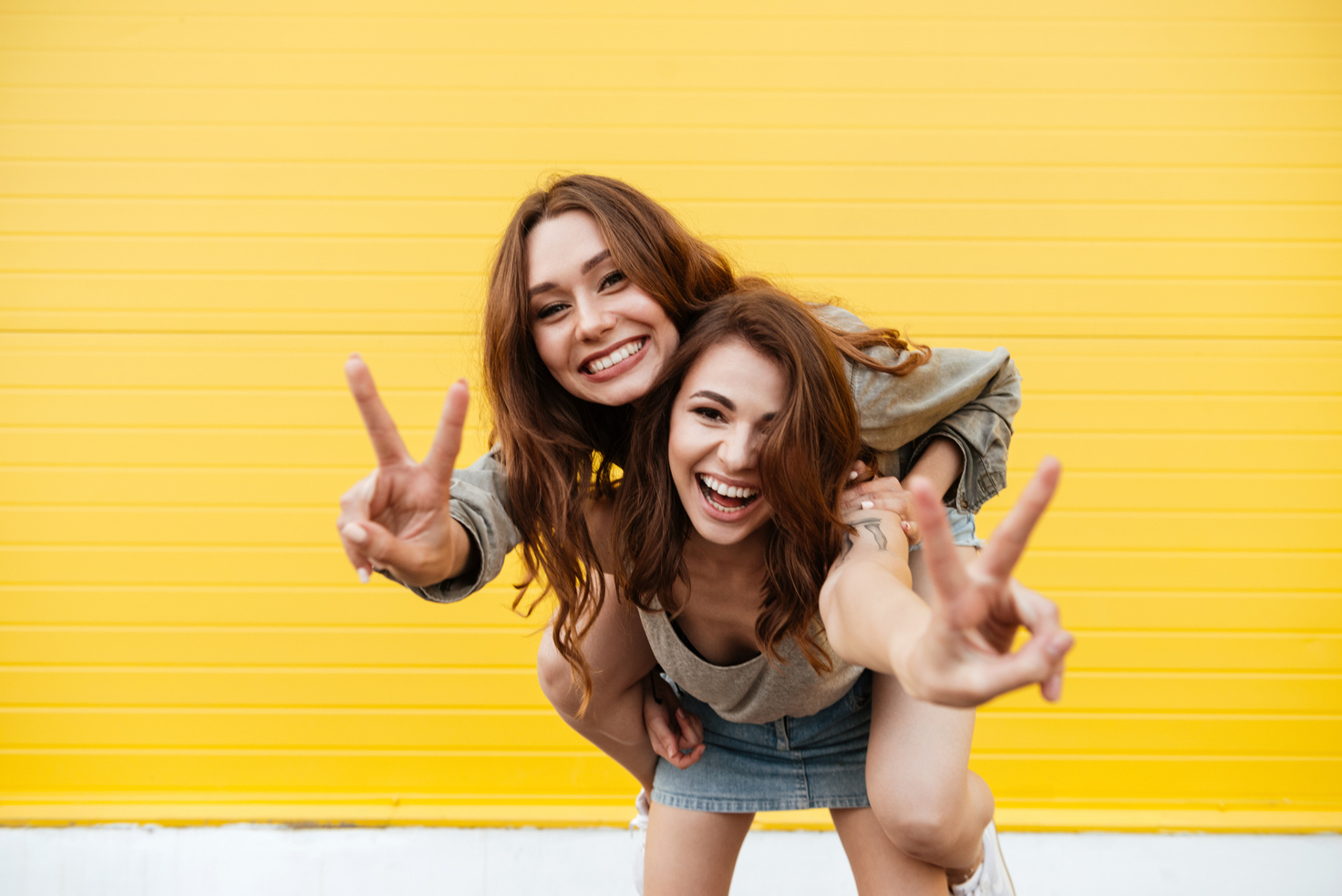 Two Young Women Friends Having Fun